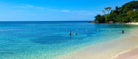 Private white sand Little Bay Beach