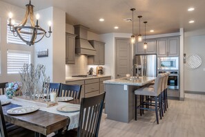 Dining Room View - With an open and spacious floor plan, the Dining Room and Kitchen can accommodate meal preparations for groups large or small.