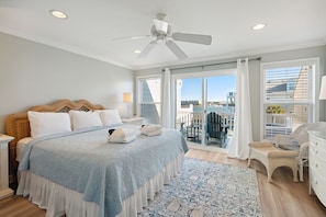 Main bedroom featuring a King bed, private balcony and marsh views.