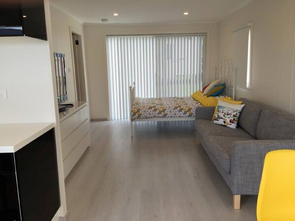 Double bed in lounge area