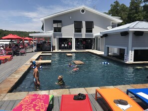 Relax poolside and/or enjoy salt water pool at nearby Boathouse