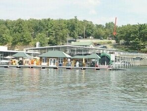 The gas dock offers fuel and sundries. Arrow points to house.