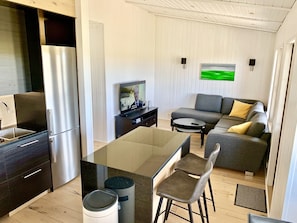 Lundur. Open kitchen-living room area with gorgeous views.