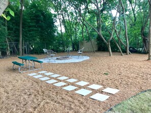 Beautiful gravel backyard with fire pit