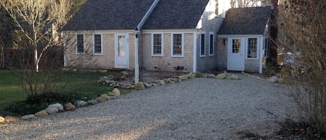 Front of House with mudroom on right and parking for 3 vehicles
