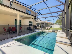 Screened back yard with Pool and Spa