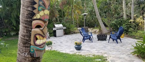 Large patio with grill and fire pit