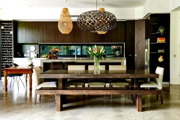 huge wooden table in dining space