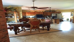 Dining Area off the deck with travertine floors