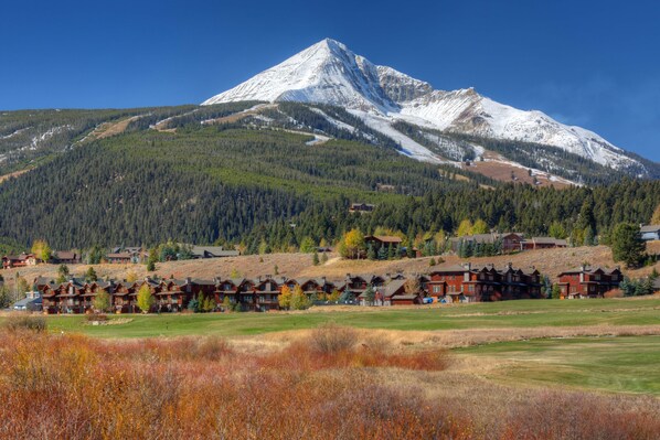 Complex with lone peak in back ground