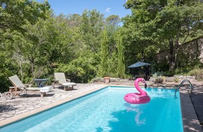 Salt water swimming pool above brook
