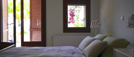 The master bedroom with access to the garden.