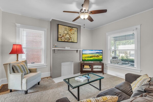 Living room w/ sleeper sofa and smart TV