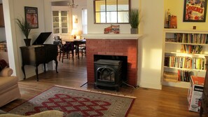 From sleeper porch, enter living room w' queen sofa sleeper, propane fireplace.