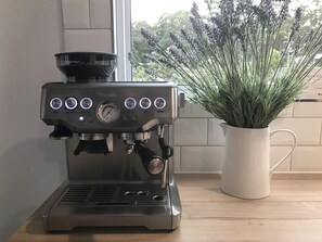 Breville Coffee Machine. Some beans provided.
