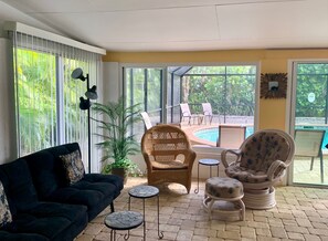 There's a futon & 2 chairs for relaxing or watching TV, plus a view of pool