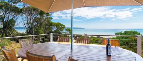 Your private deck overlooking the ocean, wine and views included.....