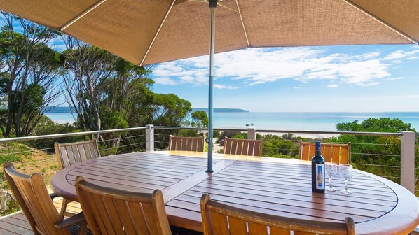 Your private deck overlooking the ocean, wine and views included.....