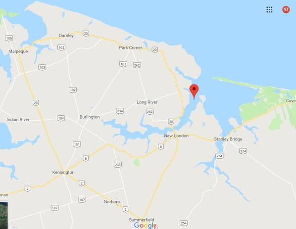 The red indicator shows where the salt water estuary "river" we call the Southwest River begins. The cottage is  to the left of the Hwy 20 bridge - minutes by water from the Sou'West Restaurant in New London