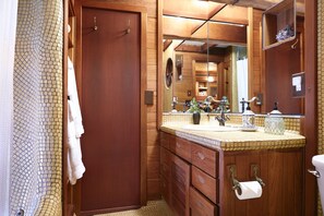 Quaint bathroom with unique tiling!