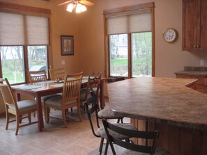Dining table seats 6 and island seats 4

