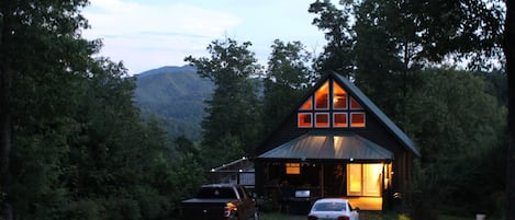 Front of cabin at dusk