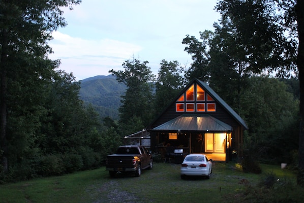 Front of cabin at dusk