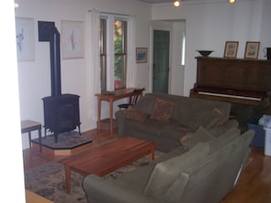 living room looking at piano