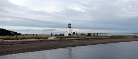 Sandy Point beach with  lighthouse-3 minute walk down the hill from cottage. 