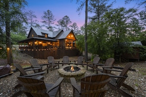 Grand fire pit with Adirondack chairs!