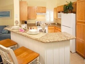 Fully-Equipped Kitchen with Granite Counters