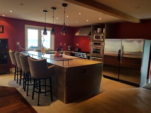 The fantastic chefs kitchen with top of the line appliances.