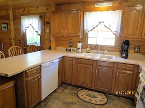 kitchen with dishwasher/microwave/coffee maker/toaster