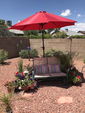 The large umbrella can be moved to any location to provide shade.