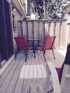 Another view of the deck.  There is a gas grill to the right of the chair.
