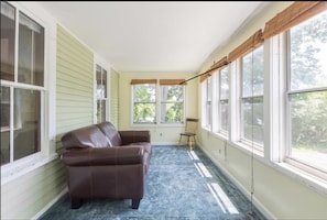 The sunporch is a great place to enjoy a cup of tea. Also a great kids playspace