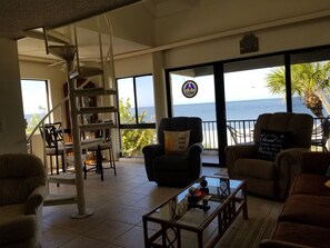 L shaped living/dining room with beautiful gulf front views.