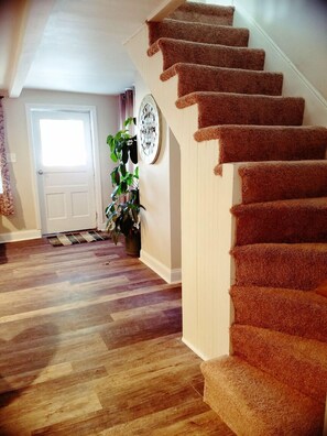 FOYER - entrance, stairway to bedroom, wood floor, cozy and welcoming