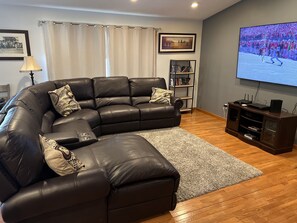 New power couch and 82 inch television for 2023!
