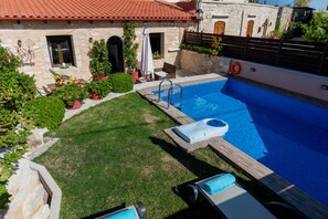 Romantic terrace with private pool, outdoor sitting and dining areas!