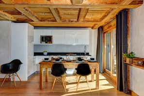 Modern well equipped kitchen and dining space