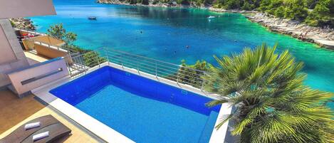 Property, Swimming Pool, Azure, Natural Landscape, Vacation, Bay, Resort, Real Estate, Caribbean, House