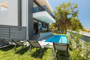 Sophisticated pool surroundings offering a sense of tranquility. 