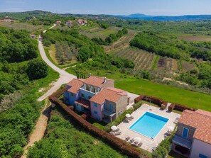 Building, Property, Sky, Plant, Natural Landscape, Slope, Land Lot, Highland, Urban Design, House