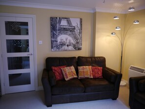 Modern artwork and lighting throughout