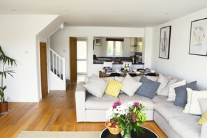 Ground floor: Open plan living space with sitting and dining areas seating six