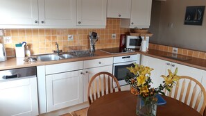 Fully equipped kitchen.  Undercounter fridge, freezer, dishwasher