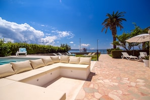 Comfortable lounge sitting area attached to the pool