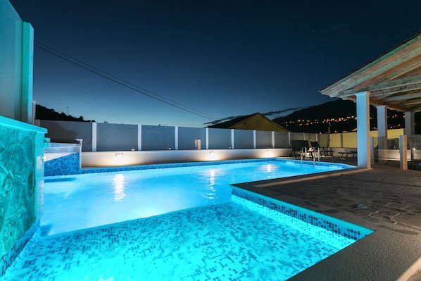 Pool lights for relaxing night swimming.