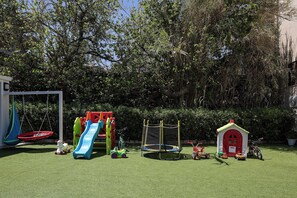 Children’s playground and two soccer goals